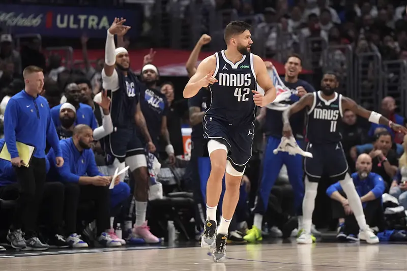 Dallas Mavericks forward Maxi Kleber (42) celebrates against the LA Clippers in the first half during game five of the first round for the 2024 NBA playoffs at Crypto.com Arena. Mandatory Credit: Kirby Lee-USA TODAY Sports