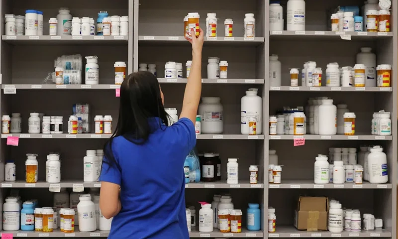 MIDVALE, UT - SEPTEMBER 10: A pharmacy technician grabs a bottle of drugs off a shelve at the central pharmacy of Intermountain Heathcare on September 10, 2018 in Midvale, Utah. IHC along with other hospitals and philanthropies are launching a nonprofit generic drug company called "Civica Rx" to help reduce cost and shortages of generic drugs. (Photo by George Frey/Getty Images)