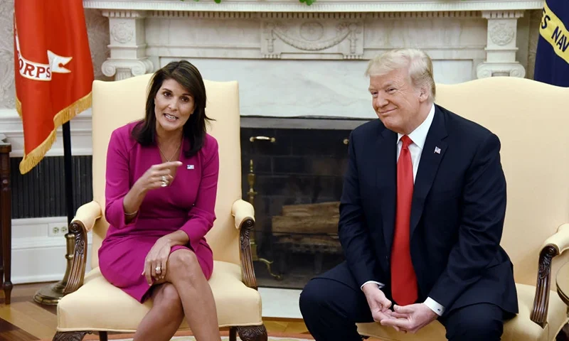 US President Donald Trump meets with Nikki Haley, the United States Ambassador to the United Nations in the Oval office of the White House on October 9, 2018 in Washington, DC. - Nikki Haley resigned Tuesday as the US ambassador to the United Nations, in the latest departure from President Donald Trump's national security team. Meeting Haley in the Oval Office, Trump said that Haley had done a "fantastic job" and would leave at the end of the year. (Photo by Olivier Douliery / AFP) (Photo credit should read OLIVIER DOULIERY/AFP via Getty Images)