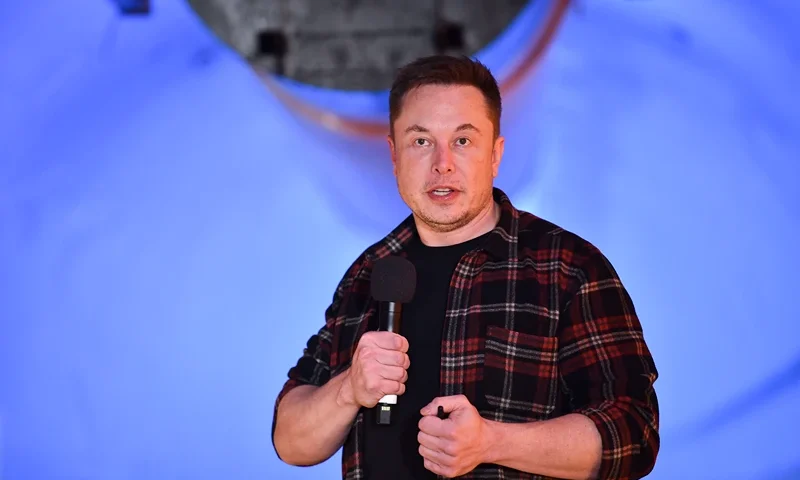 US-SCIENCE-TECHNOLOGY-COMPUTERS-TRANSPORT-TUNNEL-BORING-MUSK Elon Musk, co-founder and chief executive officer of Tesla Inc., speaks during an unveiling event for the Boring Company Hawthorne test tunnel in Hawthorne, south of Los Angeles, California on December 18, 2018. - Musk explained that the snail moves 14 times faster than a tunnel-digging machine. On Tuesday night December 18, 2018, Boring Co. officially opened the Hawthorne tunnel, a preview of Elon Musk's larger vision to ease L.A. traffic. (Photo by Robyn Beck / POOL / AFP) (Photo credit should read ROBYN BECK/AFP via Getty Images)