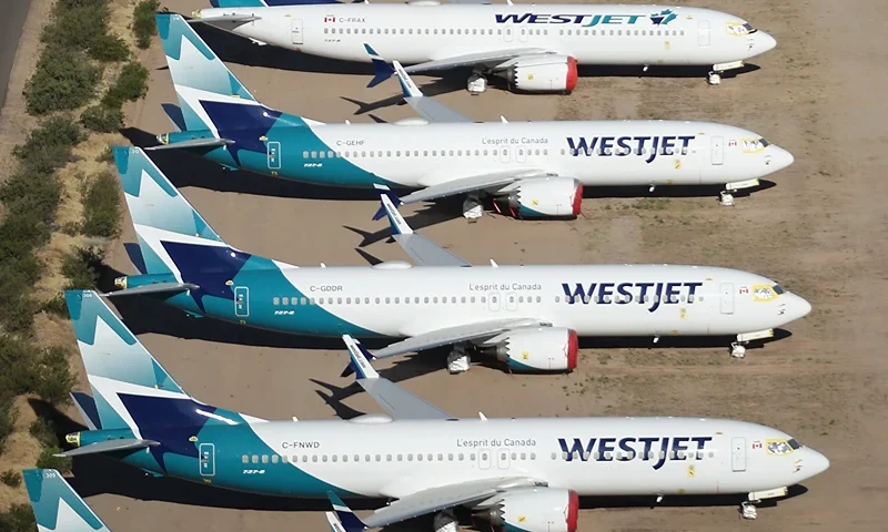 Commercial Airlines Park Dormant Planes At Pinal Airpark Outside Of Tucson, Arizona MARANA, ARIZONA - MAY 16: Decommissioned and suspended Westjet commercial aircrafts are seen stored in Pinal Airpark on May 16, 2020 in Marana, Arizona. Pinal Airpark is the largest commercial aircraft storage facility in the world, currently holding increased numbers of aircraft in response to the coronavirus COVID-19 pandemic. (Photo by Christian Petersen/Getty Images)