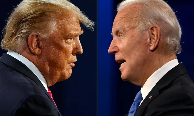 (COMBO) This combination of pictures created on October 22, 2020 shows US President Donald Trump (L) and Democratic Presidential candidate and former US Vice President Joe Biden during the final presidential debate at Belmont University in Nashville, Tennessee, on October 22, 2020. (Photos by Morry GASH and JIM WATSON / AFP) (Photo by MORRY GASH,JIM WATSON/AFP via Getty Images)