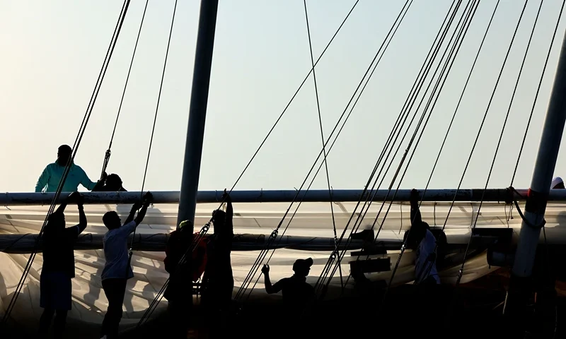 UAE-LIFESTYLE-HERITAGE-TRADITION Sailors participate in the annual long-distance dhow sailing race, known as al-Gaffal, near Sir Abu Nuair island towards the Gulf emirate of Dubai, on June 3, 2022. - Around Sir Bu Nair, a teardrop-shaped island roughly 100 kilometres (60 miles) away from both Dubai and Abu Dhabi, 118 teams are racing dhows, the sailboats that have plied waters around the Arabian peninsula for centuries. (Photo by Karim SAHIB / AFP) (Photo by KARIM SAHIB/AFP via Getty Images)