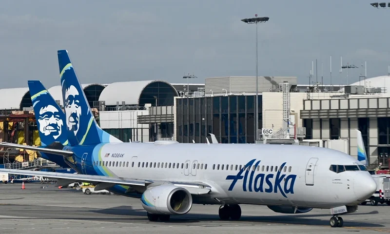 US-TRAVEL-AIR-PLANE An Alaska airlines plane seen at Los Angeles International Airport (LAX) on January 11, 2023. (Photo by Daniel SLIM / AFP) (Photo by DANIEL SLIM/AFP via Getty Images)