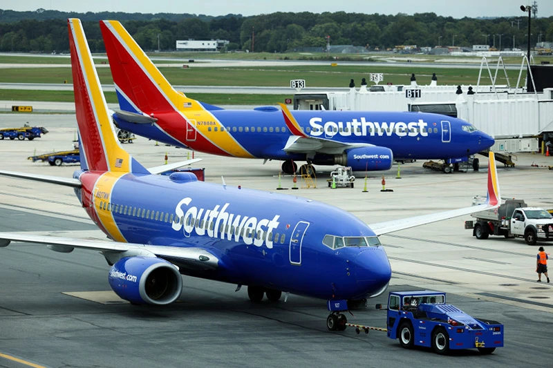 BALTIMORE, MARYLAND - OCTOBER 11: A Southwest Airlines airplane taxies from a gate at Baltimore Washington International Thurgood Marshall Airport on October 11, 2021 in Baltimore, Maryland. Southwest Airlines is working to catch up on a backlog after canceling hundreds of flights over the weekend, blaming air traffic control issues and weather. (Photo by Kevin Dietsch/Getty Images)