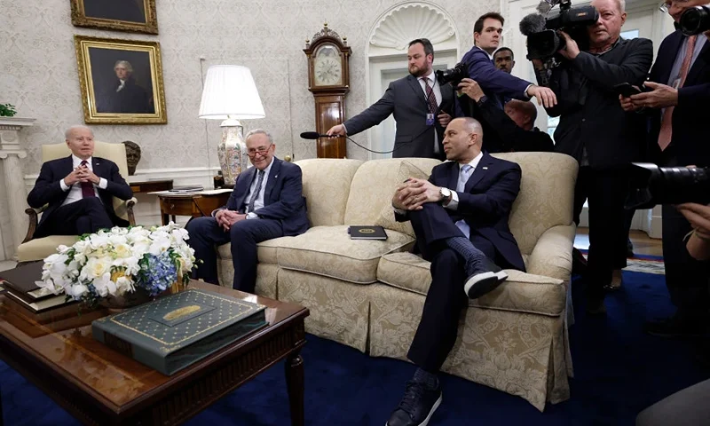 WASHINGTON, DC - MAY 09: U.S. President Joe Biden, Senate Majority Leader Charles Schumer (D-NY) and House Minority Leader Hakeem Jeffries (D-NY) meet with members of the Republican eadership in the Oval Office of the White House on May 09, 2023 in Washington, DC. The Congressional lawmakers met with the President to negotiate how to address the debt ceiling before June 1, when U.S. Treasury Secretary Janet Yellen warned Congress that the United States would default on their debts. (Photo by Anna Moneymaker/Getty Images)