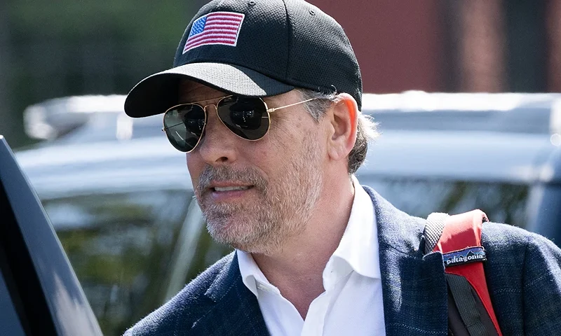 Hunter Biden walks to a waiting SUV after arriving with US President Joe Biden on Marine One at Fort McNair in Washington, DC, July 4, 2023, as they return to Washington after spending the weekend at Camp David, the presidential retreat in Maryland. (Photo by SAUL LOEB / AFP) (Photo by SAUL LOEB/AFP via Getty Images)