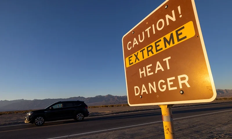 Temperatures In Death Valley National Park Could Break All Time Record FURNACE CREEK, CALIFORNIA - JULY 15: A car passes a sign warning of extreme heat danger on the eve of a day that could set a new world heat record in Death Valley National Park on July 15, 2023 near Furnace Creek, California. Weather forecasts for tomorrow call for a high temperature of 129º Fahrenheit and possibly as high as 131. Previously, the highest temperature reliably recorded on Earth was 129.2F (54C) in Death Valley in 2013. A century earlier a high temperature in Death Valley reportedly reached 134F but many modern weather experts have rejected that claim along with other high summer temperatures reported in the region that year. (Photo by David McNew/Getty Images)