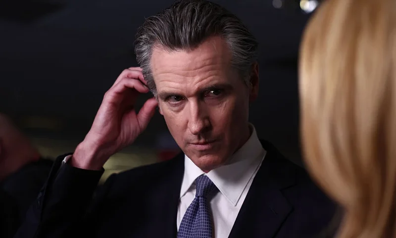 SIMI VALLEY, CALIFORNIA - SEPTEMBER 27: California Gov. Gavin Newsom talks to reporters in the spin room following the FOX Business Republican Primary Debate at the Ronald Reagan Presidential Library on September 27, 2023 in Simi Valley, California. Seven presidential hopefuls squared off in the second Republican primary debate as former U.S. President Donald Trump, currently facing indictments in four locations, declined again to participate. (Photo by Mario Tama/Getty Images)