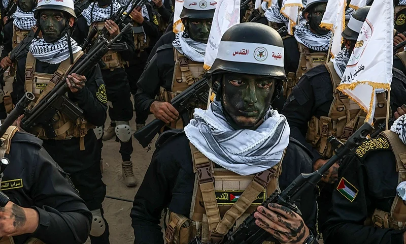 Palestinian Islamic Jihad militants parade during a rally marking the 36th anniversary of the movement's foundation, in Gaza City on October 6, 2023. (Photo by Mohammed ABED / AFP) (Photo by MOHAMMED ABED/AFP via Getty Images)