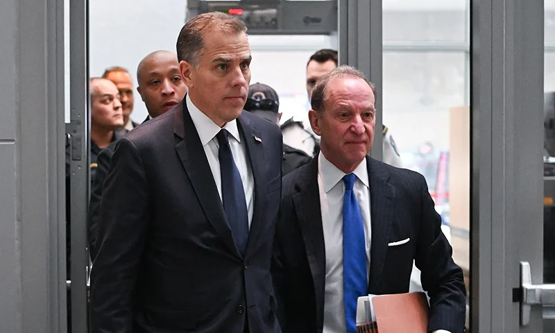 (L-R) Hunter Biden, son of US President Joe Biden, and attorney Abbe Lowell arrive for a closed-door deposition with the House Oversight and Judiciary committees on Capitol Hill in Washington, DC, February 28, 2024. (Photo by ROBERTO SCHMIDT / AFP) (Photo by ROBERTO SCHMIDT/AFP via Getty Images)