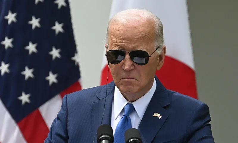 US President Joe Biden listens during a joint press conference with Japanese Prime Minister Fumio Kishida (out of frame) in the Rose Garden of the White House in Washington, DC, April 10, 2024. (Photo by ANDREW CABALLERO-REYNOLDS / AFP) (Photo by ANDREW CABALLERO-REYNOLDS/AFP via Getty Images)