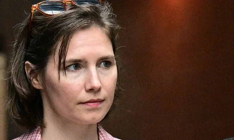 ITALY-JUSTICE-US-KNOX US Amanda Knox arrives at the courthouse in Florence, on June 5, 2024 before a hearing in a slander case, related to her jailing and later acquittal for the murder of her British roommate in 2007. The American was only 20 when she and her Italian then-boyfriend were arrested for the brutal killing of 21-year-old fellow student Meredith Kercher at the girls' shared home in Perugia. The murder began a long legal saga where Knox was found guilty, acquitted, found guilty again and finally cleared of all charges in 2015. (Photo by Tiziana FABI / AFP) (Photo by TIZIANA FABI/AFP via Getty Images)