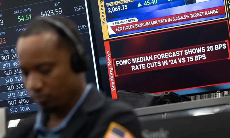 CHICAGO, ILLINOIS - JUNE 12: Traders work in the S&P options pit at the Cboe Global Markets exchange following the Fed's announcement on interest rates on June 12, 2024 in Chicago, Illinois. The Federal Reserve today held interest rates steady at their current range of 5.25% to 5.5%, but revised its outlook for rate cuts to just one in 2024. (Photo by Scott Olson/Getty Images)