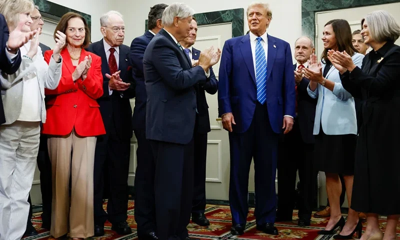 WASHINGTON, DC - JUNE 13: Republican presidential candidate, former U.S. President Donald Trump is applauded by Senate Republicans before giving remarks to the press at the National Republican Senatorial Committee building on June 13, 2024 in Washington, DC. Trump is visiting Capitol Hill to meet with House and Senate Republicans. (Photo by Anna Moneymaker/Getty Images)