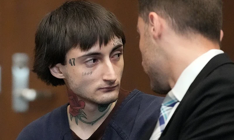 WAUKEGAN, IL - JUNE 26: Robert E. Crimo III speaks to Lake County's assistant public defender Anton Trizna as he appears for a hearing before Judge Victoria A. Rossetti at the Lake County Courthouse on June 26, 2024 in Waukegan, Illinois. Crimo III is charged with killing seven people and wounding dozens more in a shooting at July 4th parade in the suburban Chicago town of Highland Park in 2022. (Photo by Nam Y. Huh-Pool/Getty Images)