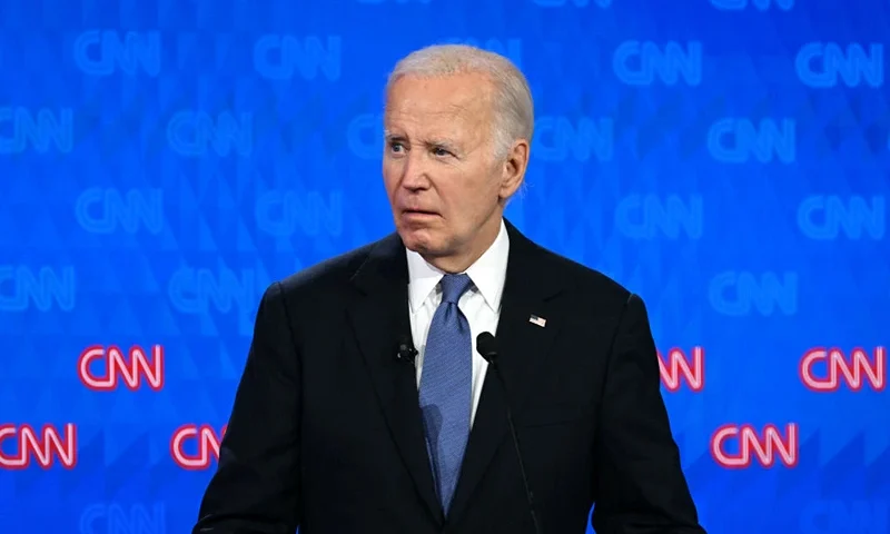 TOPSHOT - US President Joe Biden looks on as he participates in the first presidential debate of the 2024 elections with former US President and Republican presidential candidate Donald Trump at CNN's studios in Atlanta, Georgia, on June 27, 2024. (Photo by ANDREW CABALLERO-REYNOLDS / AFP) (Photo by ANDREW CABALLERO-REYNOLDS/AFP via Getty Images)