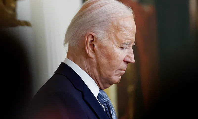 WASHINGTON, DC - JULY 03: U.S. President Joe Biden bows his head for a prayer during a Medal of Honor ceremony in the East Room of the White House on July 03, 2024 in Washington, DC. Biden presented the awards posthumously to two Union U.S. soldiers Philip Shadrach and George Wilson who fought during the Civil War and participated in an undercover mission which later known as the “Great Locomotive Chase.” (Photo by Anna Moneymaker/Getty Images)