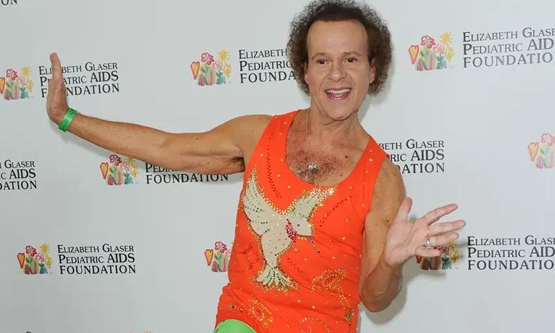 US fitness coach Richard Simmons attends the 2013 "A Time For Heroes" held at the century park in Los Angeles, June 2, 2013. Richard Simmons, Legendary Fitness Guru and TV Personality, Dies at 76. (Photo by Chris DELMAS / AFP) (Photo by CHRIS DELMAS/AFP via Getty Images)