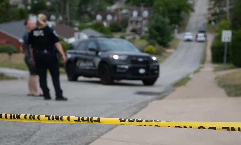 Police continue to block off roads around Thomas Matthew Crooks' home as the FBI carries out its investigation into assassination attempt of former US President Donald Trump, in Bethel Park, Pennsylvania, on July 14, 2024. Trump, the presumptive Republican presidential candidate, was shot in the ear July 13 in the opening minutes of his campaign rally in Butler. Rivals Joe Biden and Donald Trump urged Americans to show unity on July 14, after an assassination attempt on the Republican that the FBI said was carried out by a shooter with a legally-bought semi-automatic rifle. (Photo by Rebecca DROKE / AFP) (Photo by REBECCA DROKE/AFP via Getty Images)