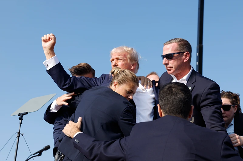 Donald Trump Holds A Campaign Rally In Butler, Pennsylvania
BUTLER, PENNSYLVANIA - JULY 13: Republican presidential candidate former President Donald Trump is rushed offstage during a rally on July 13, 2024 in Butler, Pennsylvania. (Photo by Anna Moneymaker/Getty Images)