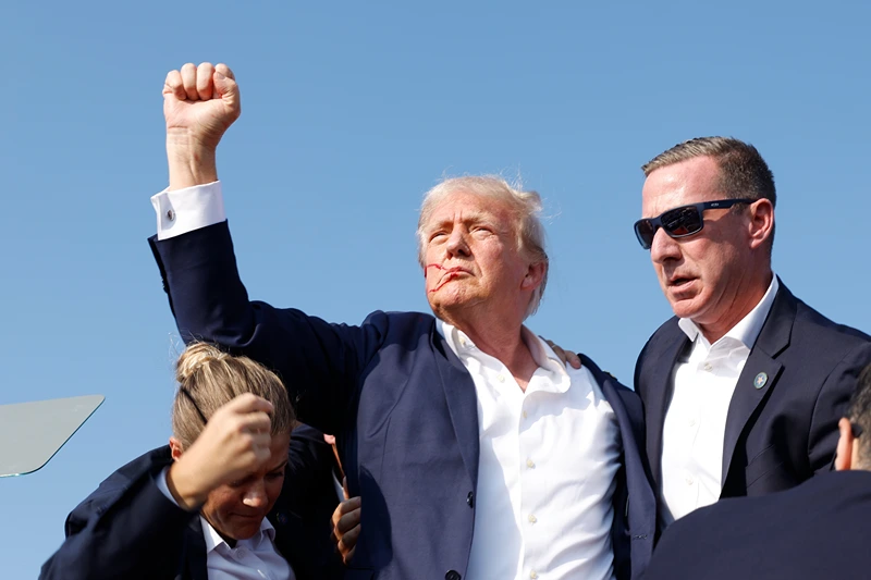 BUTLER, PENNSYLVANIA - JULY 13: Republican presidential candidate former President Donald Trump is rushed offstage during a rally on July 13, 2024 in Butler, Pennsylvania. Butler County district attorney Richard Goldinger said the shooter is dead after injuring former U.S. President Donald Trump, killing one audience member and injuring another in the shooting. (Photo by Anna Moneymaker/Getty Images