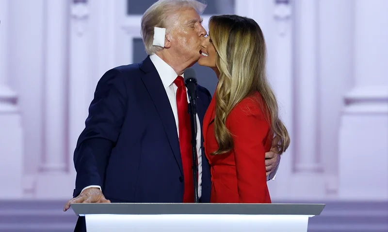 MILWAUKEE, WISCONSIN - JULY 18: Republican presidential nominee, former U.S. President Donald Trump kisses former first lady Melania Trump after officially accepting the Republican presidential nomination on stage on the fourth day of the Republican National Convention at the Fiserv Forum on July 18, 2024 in Milwaukee, Wisconsin. Delegates, politicians, and the Republican faithful are in Milwaukee for the annual convention, concluding with former President Donald Trump accepting his party's presidential nomination. The RNC takes place from July 15-18. (Photo by Chip Somodevilla/Getty Images)