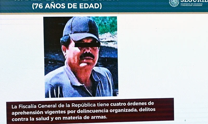 A picture of Sinaloa cartel co-founder, Mexican drug trafficker Ismael "Mayo" Zambada, is seen on screen during Mexican President Andres Manuel Lopez Obrador's usual morning press conference at the National Palace in Mexico City on July 26, 2024. Mexican authorities did not participate in the arrest of Ismael "Mayo" Zambada, co-founder of the Sinaloa cartel, and a son of Joaquin "El Chapo" Guzman, carried out on July 25 in Texas by US authorities, the Mexican Security Secretary announced on Friday. (Photo by ALFREDO ESTRELLA / AFP) (Photo by ALFREDO ESTRELLA/AFP via Getty Images)