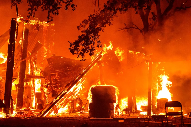 US-ENVIRONMENT-CLIMATE-FIRE
A property is seen in flames as the Park fire continues to burn near Paynes Creek in unincorporated Tehama County, California on July 26, 2024. A huge, fast-moving and rapidly growing wildfire in northern California has forced more than 4,000 people to evacuate as firefighters battle gusty winds and perilously dry conditions, authorities said on July 26. (Photo by JOSH EDELSON / AFP) (Photo by JOSH EDELSON/AFP via Getty Images)