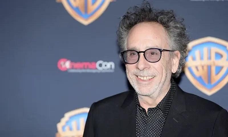 Director and producer Tim Burton, promoting the film Beetlejuice Beetlejuice, poses on the red carpet during a Warner Bros. presentation at CinemaCon, the official convention of the National Association of Theatre Owners, in Las Vegas, Nevada, U.S. April 9, 2024. REUTERS/Steve Marcus/File Photo