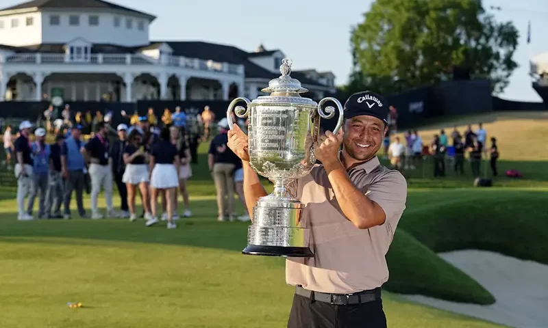 Xander Schauffele holds The Wanamaker Trophy after winning the PGA Championship golf tournament at Valhalla Golf Club. Mandatory Credit: Adam Cairns-USA TODAY Sports