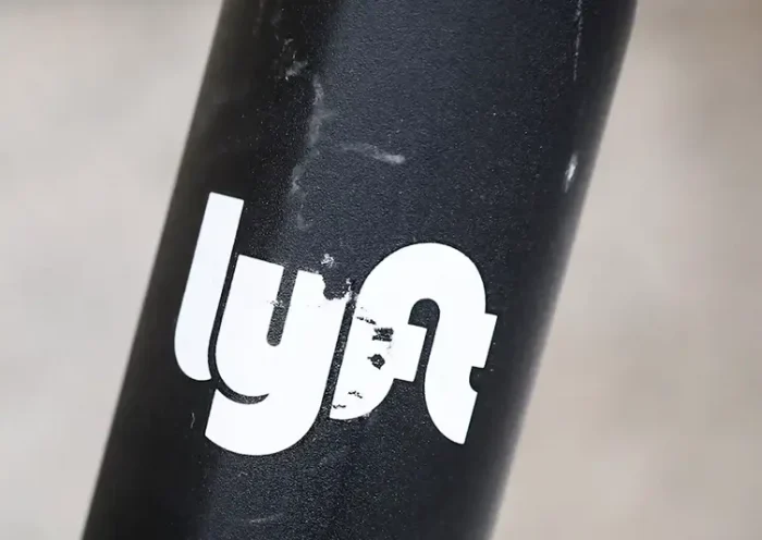 The Lyft logo is seen on a parked Lyft Scooter in Washington, U.S., March 29, 2019. REUTERS/Brendan McDermid/File Photo