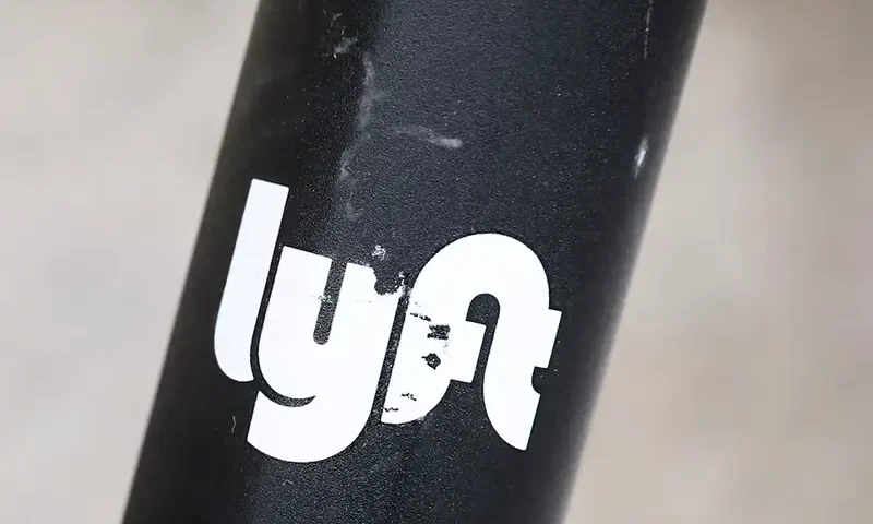 The Lyft logo is seen on a parked Lyft Scooter in Washington, U.S., March 29, 2019. REUTERS/Brendan McDermid/File Photo