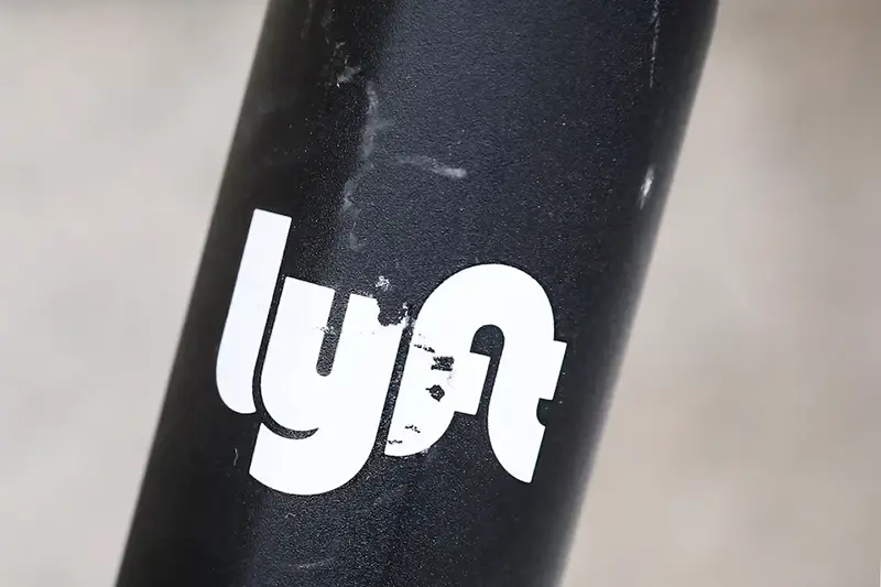 The Lyft logo is seen on a parked Lyft Scooter in Washington, U.S., March 29, 2019. REUTERS/Brendan McDermid/File Photo