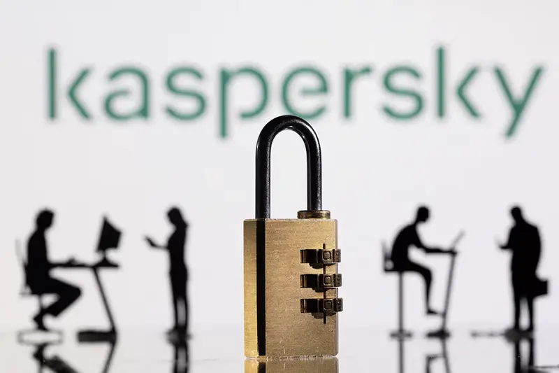 3D printed models of people working on computers and padlock are seen in front of a displayed Kaspersky logo in this picture illustration taken, February 1, 2022. REUTERS/Dado Ruvic/Illustration/File Photo