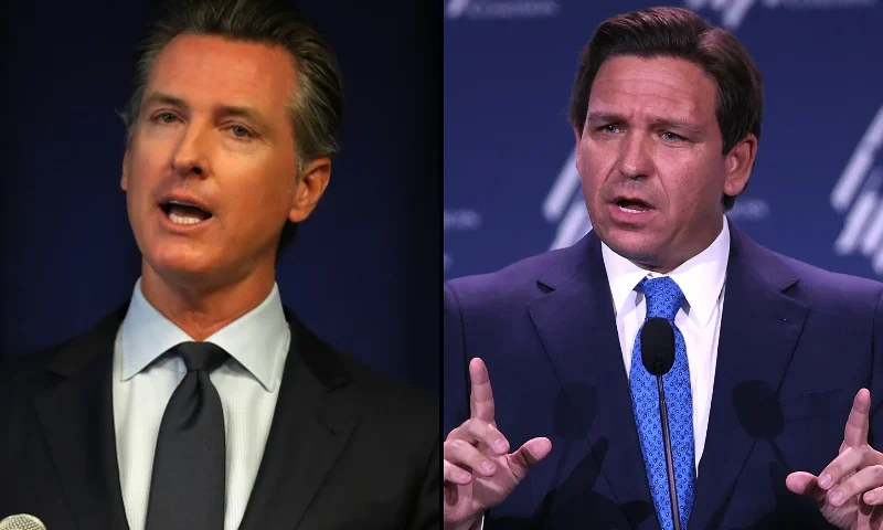 (L)SACRAMENTO, CALIFORNIA - SEPTEMBER 18: California Gov. Gavin Newsom speaks during a news conference at the California justice department on September 18, 2019 in Sacramento, California. California Gov. Gavin Newsom, California attorney general Xavier Becerra and California Air Resources Board Chair Mary Nichols held a news conference in response to the Trump Administration's plan to revoke California’s waiver to establish vehicle emissions standards for greenhouse gas emissions and standards to require manufacturers to sell zero emissions vehicles. Under the federal Clean Air Act, California is allowed to set its own vehicle emissions standards that are at least as protective as the federal government’s standards. The state has received 100 waivers from the Environmental Protection Agency (EPA) for higher standards than federally mandated over the past 50 years. (Photo by Justin Sullivan/Getty Images) (R) LAS VEGAS, NEVADA - NOVEMBER 18: Florida Governor Ron DeSantis speaks to guests at the Republican Jewish Coalition Annual Leadership Meeting on November 19, 2022 in Las Vegas, Nevada. The meeting comes on the heels of former President Donald Trump becoming the first candidate to declare his intention to seek the GOP nomination in the 2024 presidential race. (Photo by Scott Olson/Getty Images)