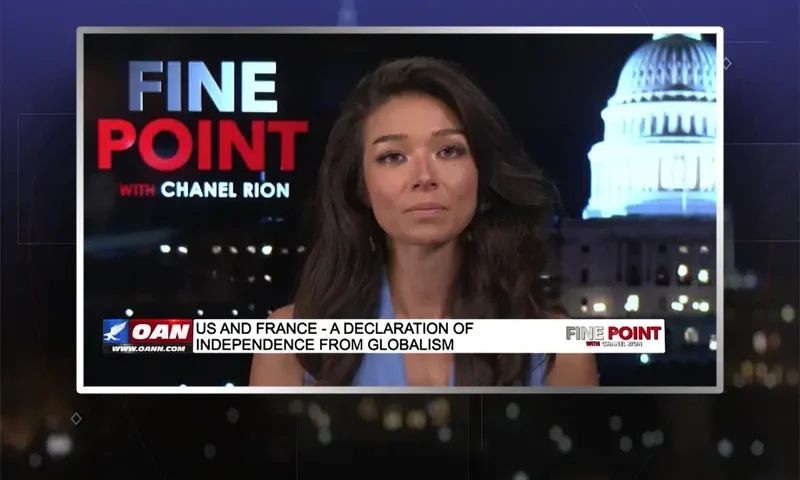 Video still of the host of Fine Point at the desk of their talk show on One America News Network.