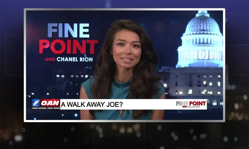 Video still of the host of Fine Point at the desk of their talk show on One America News Network.