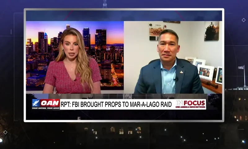 Video still from In Focus on One America News Network showing a split screen of the host on the left side, and on the right side is the guest, Captain Hung Cao.