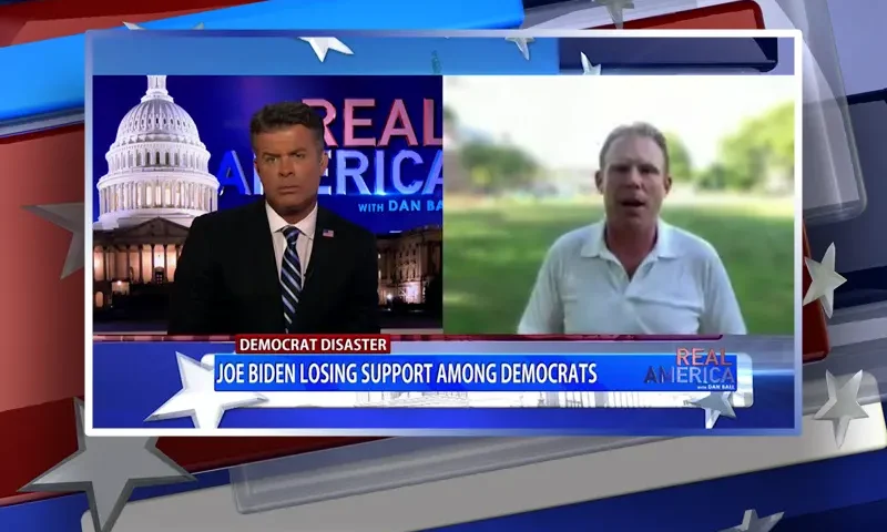 Video still from Real America on One America News Network showing a split screen of the host on the left side, and on the right side is the guest, Andrew Giuliani.