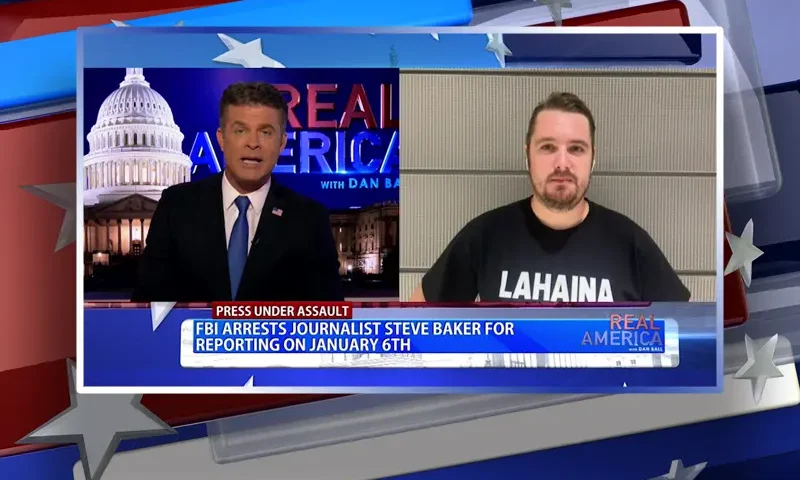 Video still from Real America on One America News Network showing a split screen of the host on the left side, and on the right side is the guest, Nick Sortor.