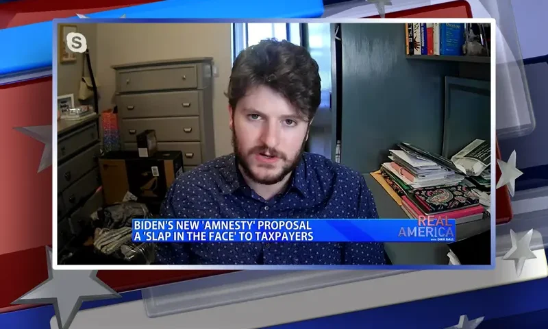 Video still from Real America on One America News Network during an interview with the guest, Gavin Wax.