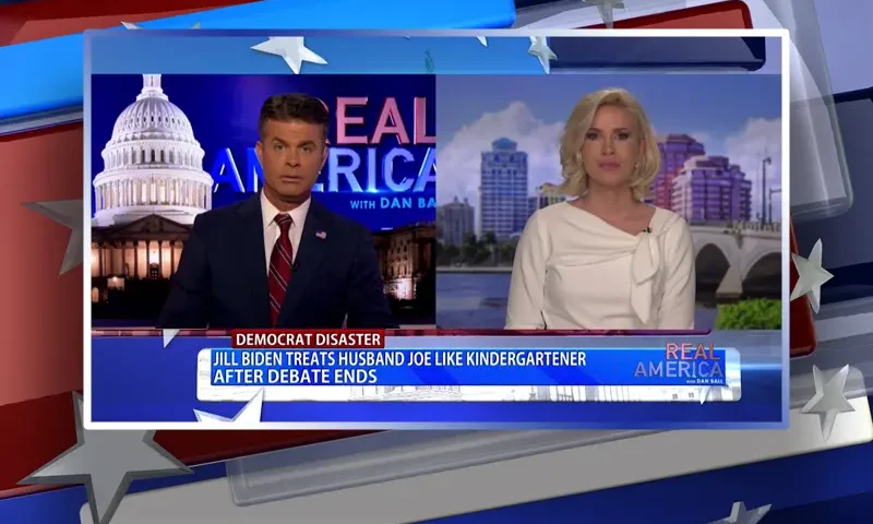 Video still from Real America on One America News Network showing a split screen of the host on the left side, and on the right side is the guest, Caroline Sunshine.