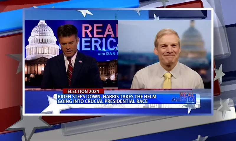 Video still from Real America on One America News Network showing a split screen of the host on the left side, and on the right side is the guest, Rep. Jim Jordan.