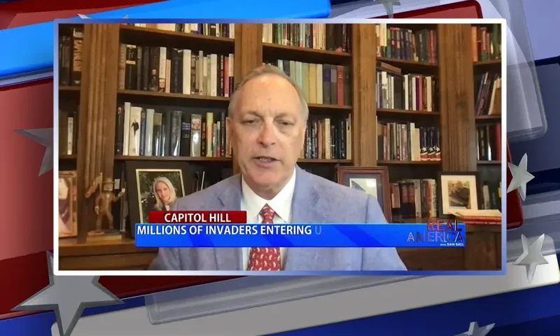 Video still from Real America on One America News Network during an interview with the guest, Rep. Andy Biggs.