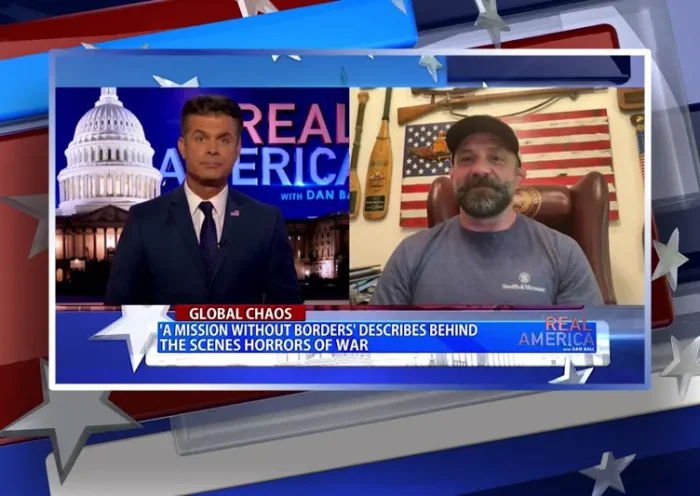 Video still from Real America on One America News Network showing a split screen of the host on the left side, and on the right side is the guest, Chad Robichaux.