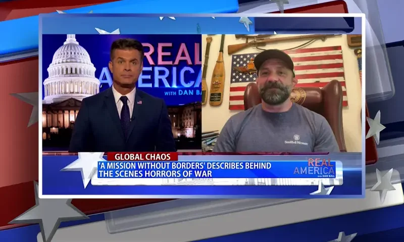 Video still from Real America on One America News Network showing a split screen of the host on the left side, and on the right side is the guest, Chad Robichaux.