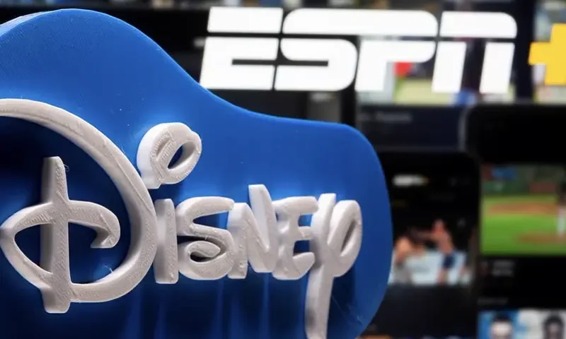 A 3D printed Disney logo is seen in front of the ESPN+ logo in this illustration taken on July 13, 2021. REUTERS/Dado Ruvic/Illustration/File Photo